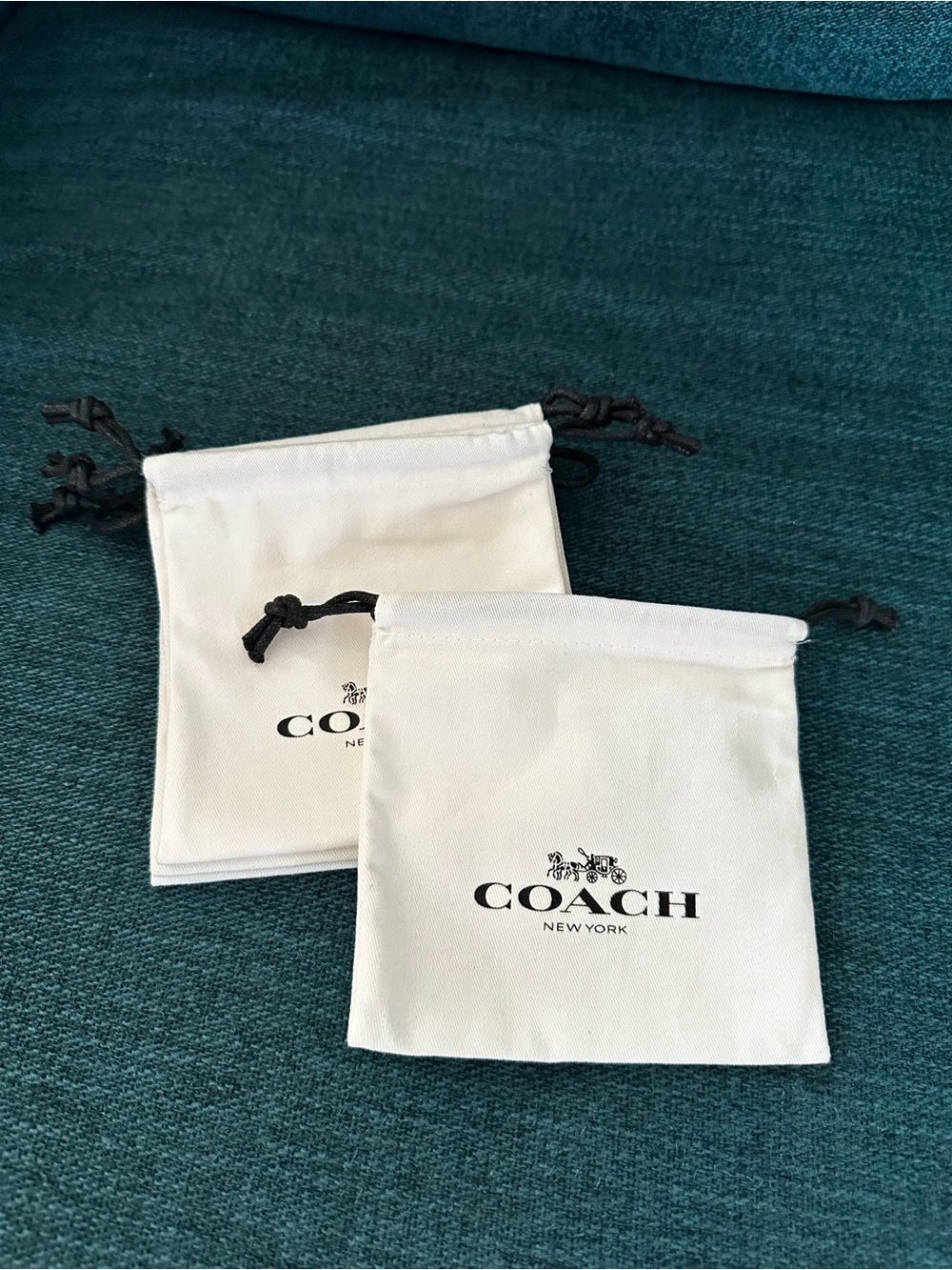 Coach White Drawstring Jewelry Pouches (Set of 5)